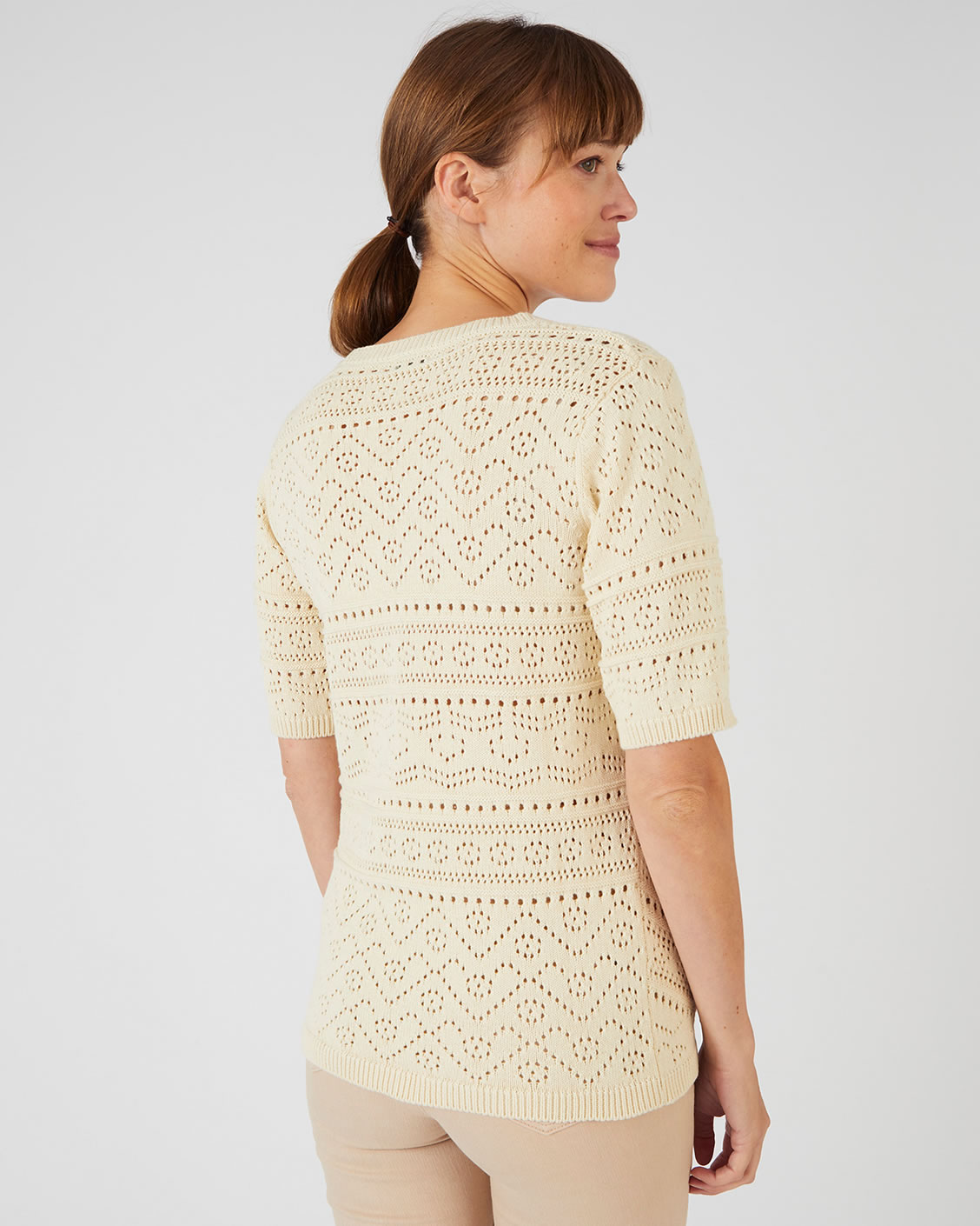 Trui van opengewerkt tricot met elleboogmouwen