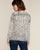 Pull in fijn tricot met panterprint