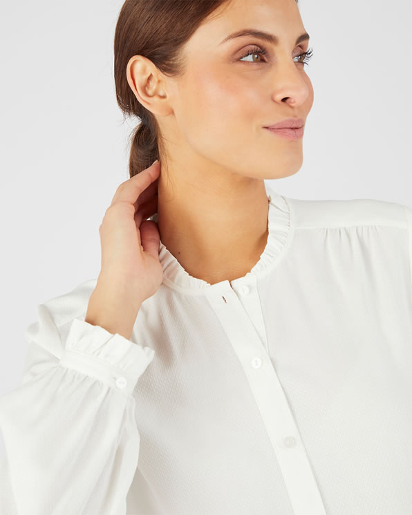 Blouse met volants aan de kraag
