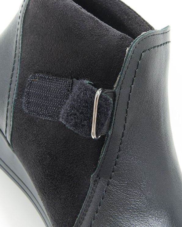 Boots dessus bi-matière à scratch
