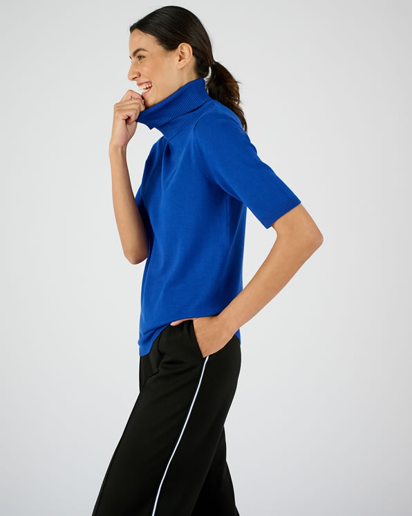 Pull col roulé côtelé maille fluide