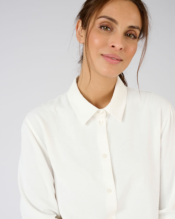 Effen blouse in reliëfstof