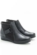 Boots dessus bi-matière à scratch