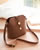 Le sac à main “COMPLICITY”